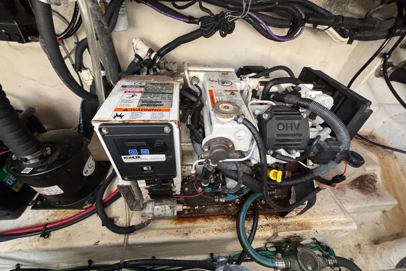 Slide: The Image of Engine compartment of a 2010 Sea Ray 370 Sundancer with Kohler generator. - 46