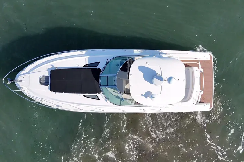 Slide: The Image of Aerial view of 2010 Sea Ray 370 Sundancer yacht cruising on water. - 8