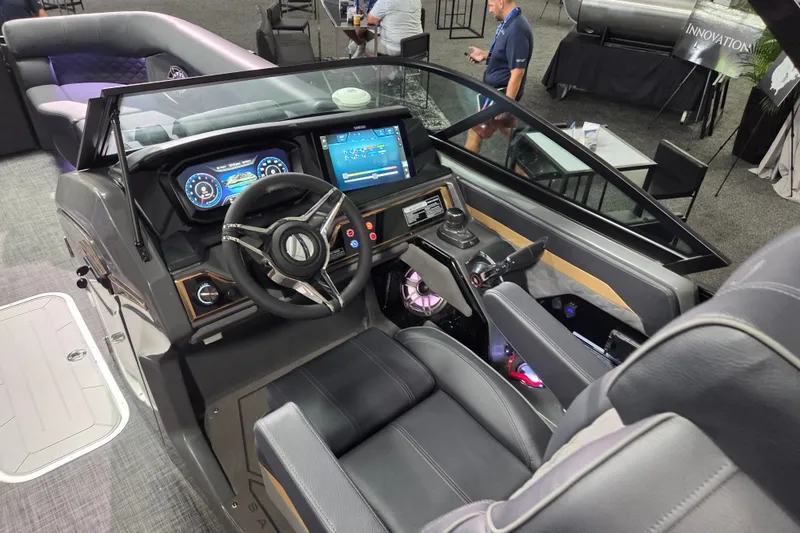 Slide: The Image of 2026 Godfrey Sanpan 2700 SBW Twin boat cockpit with modern dashboard and steering wheel. - 12