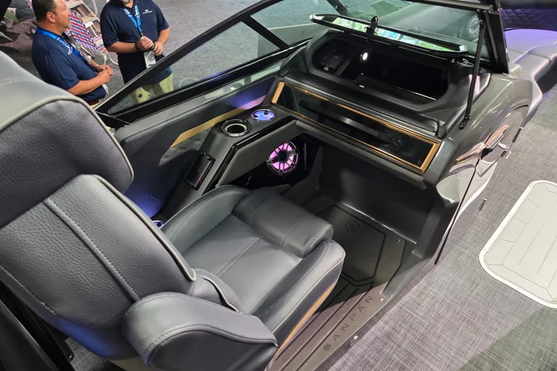 Slide: The Image of Interior of 2026 Godfrey Sanpan 2700 SBW Twin boat with luxurious seating and dashboard. - 14