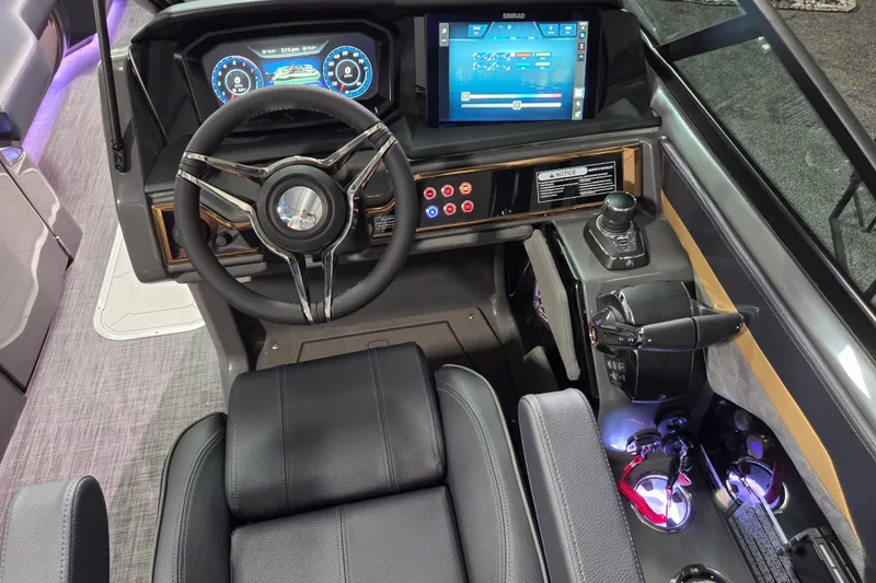 Slide: The Image of 2026 Godfrey Sanpan 2700 SBW Twin boat dashboard with modern controls and digital displays. - 20