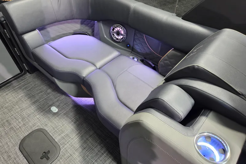 Slide: The Image of Luxurious seating on 2026 Godfrey Sanpan 2700 SBW Twin boat with ambient lighting and speaker system. - 24