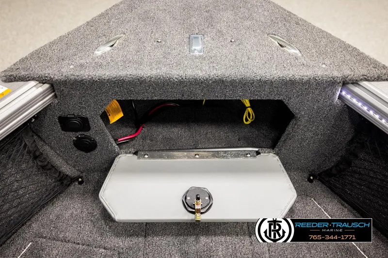 Slide: The Image of Interior of 2026 Lund 1975 Tyee boat with storage compartment and marine accessories. - 30