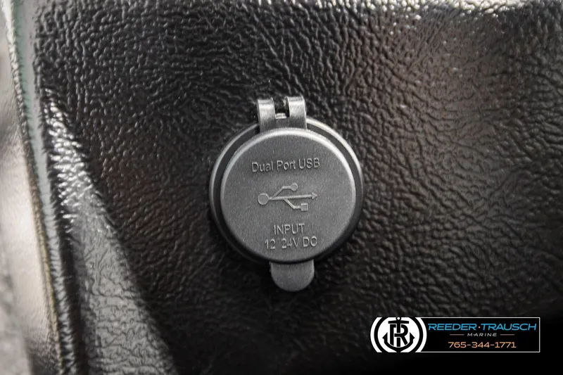 Slide: The Image of Dual port USB input on 2026 Lund 1975 Tyee boat dashboard. - 39