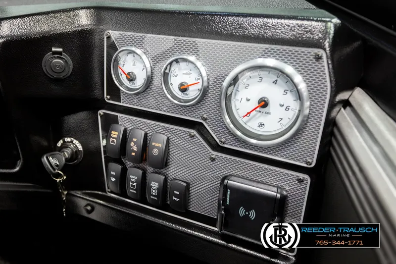 Slide: The Image of Dashboard of 2026 Lund 1975 Tyee boat with gauges and control switches. - 40