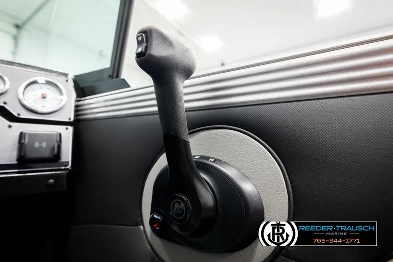 Slide: The Image of Close-up of 2026 Lund 1975 Tyee boat controls and dashboard. - 41