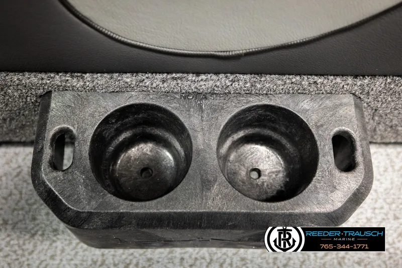 Slide: The Image of Dual cup holder in a 2026 Lund 1975 Tyee boat, Reeder-Trausch Marine logo visible. - 44