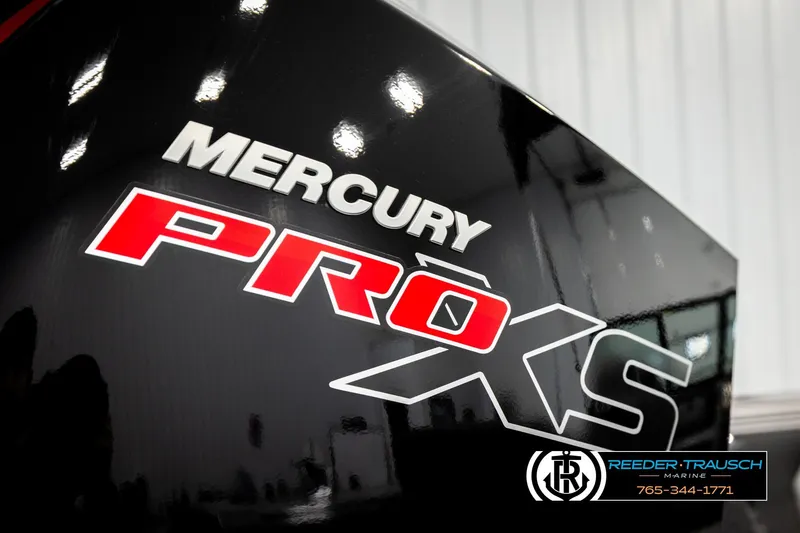 Slide: The Image of Mercury Pro XS engine detail on 2026 Lund 1975 Tyee boat, Reeder-Trausch Marine logo. - 52