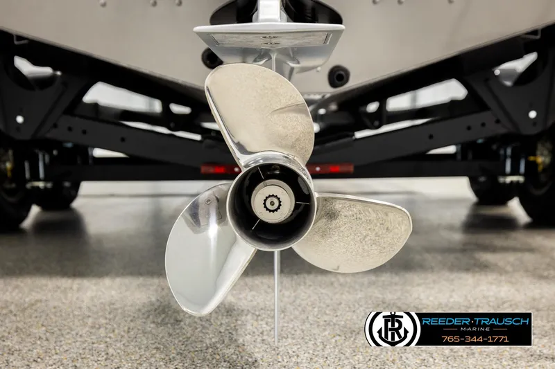 Slide: The Image of Close-up of a 2026 Lund 1975 Tyee boat propeller on display. - 54