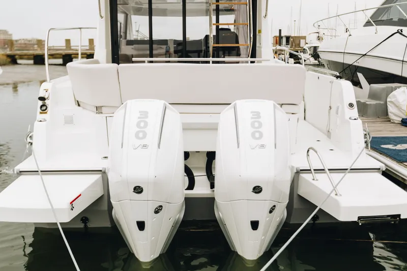 Slide: The Image of 2026 Beneteau Antares 11 Fly with twin 300 V8 engines at dock. - 8