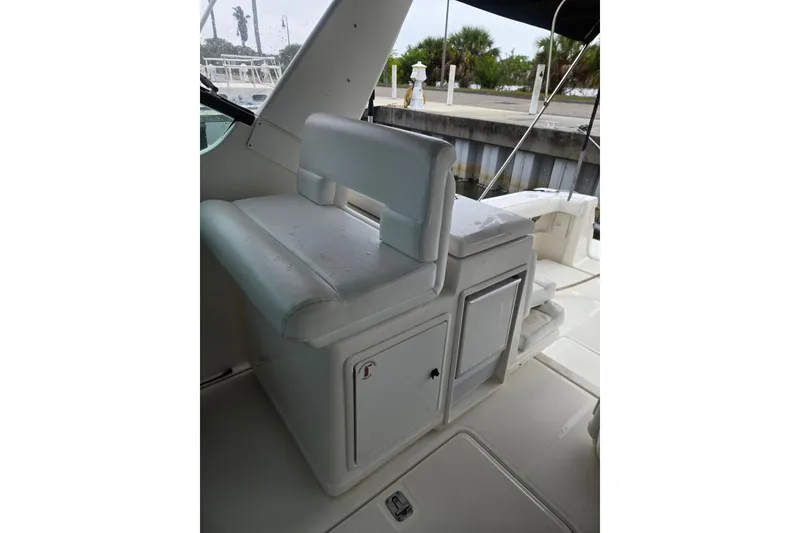 Slide: The Image of 2002 Tiara Yachts 3500 Open interior seating and storage area. - 12