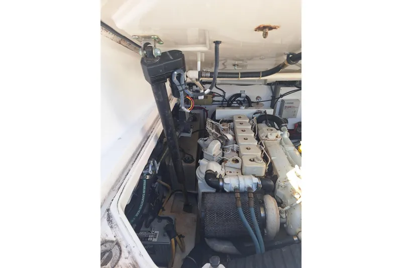 Slide: The Image of Engine compartment of a 2002 Tiara Yachts 3500 Open, showcasing mechanical components. - 30