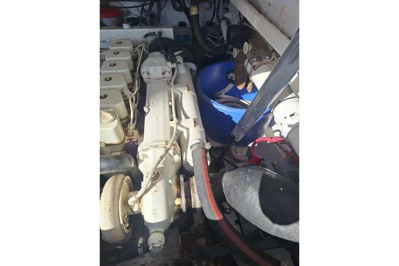 Slide: The Image of Engine compartment of a 2002 Tiara Yachts 3500 Open, showcasing mechanical components. - 31