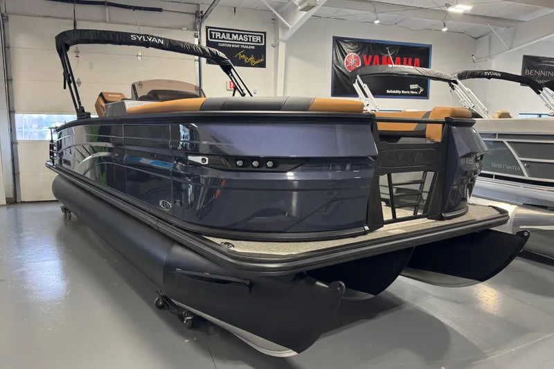 The Image of 2026 Sylvan L3 DLZ pontoon boat displayed indoors, featuring sleek design and modern amenities. - 1