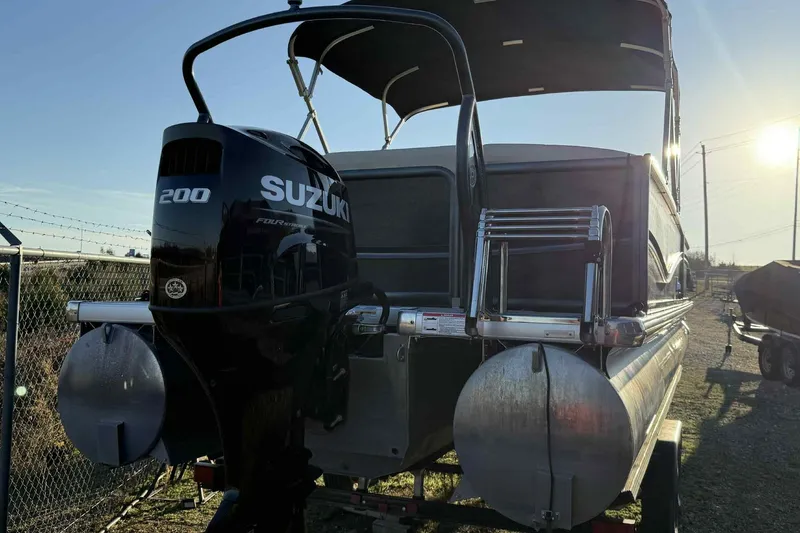 Slide: The Image of 2021 Premier 250 RE Sunsation LTD pontoon boat with Suzuki 200 outboard motor. - 13