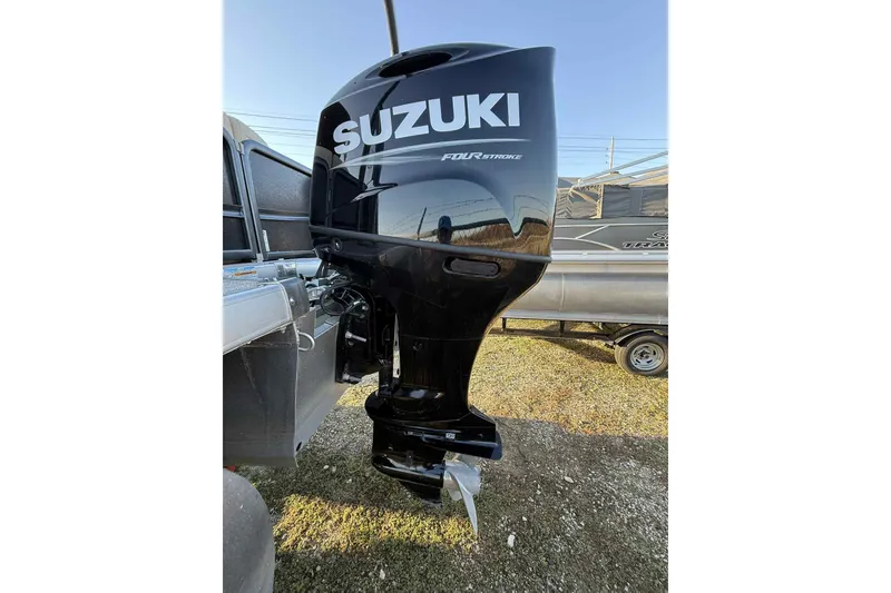 Slide: The Image of Suzuki four-stroke outboard motor on 2021 Premier 250 RE Sunsation LTD boat. - 15