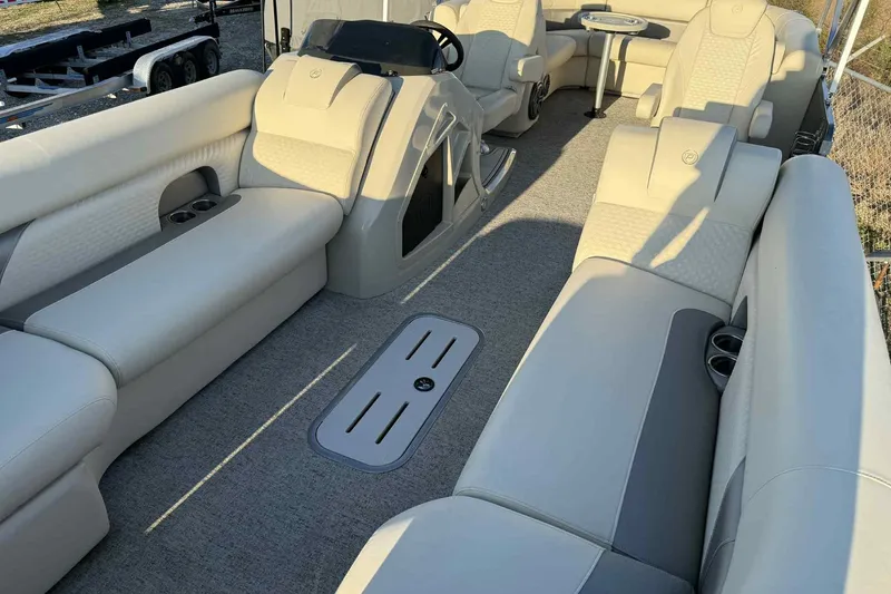 Slide: The Image of 2021 Premier 250 RE Sunsation LTD pontoon boat with luxurious seating and modern design. - 3