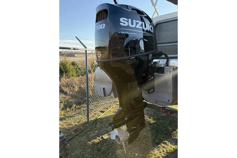 Slide: The Image of Suzuki 200 horsepower outboard motor on 2021 Premier 250 RE Sunsation LTD boat. - 4