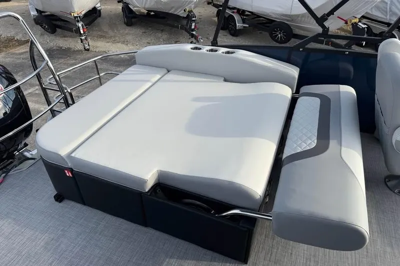 Slide: The Image of 2026 Lowe SS 230 DV boat with spacious, cushioned seating and sleek design. - 8