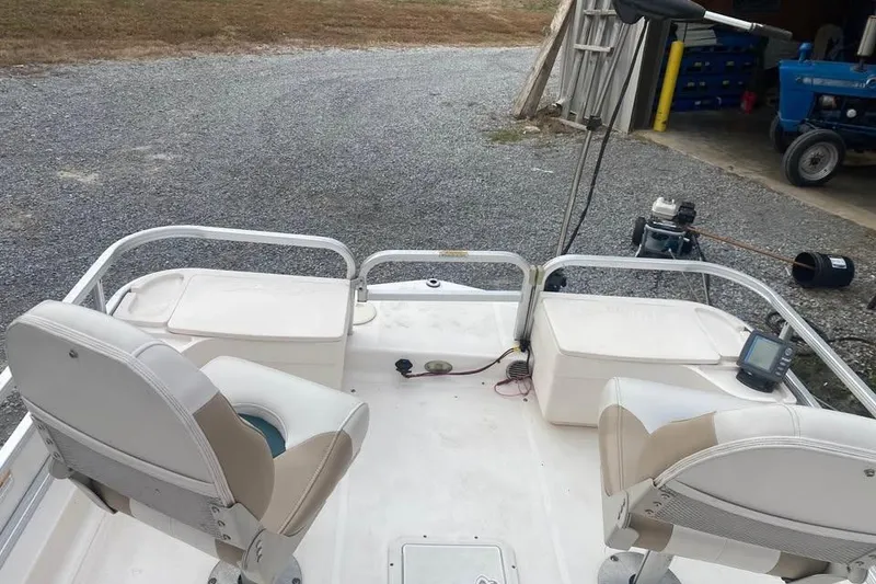 Slide: The Image of 2005 Hurricane FunDeck 196 FF boat interior with seating and equipment. - 6