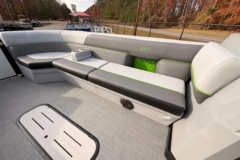 Slide: The Image of 2026 Veranda Vista Sport VS25RC boat interior with gray and green seating. - 17