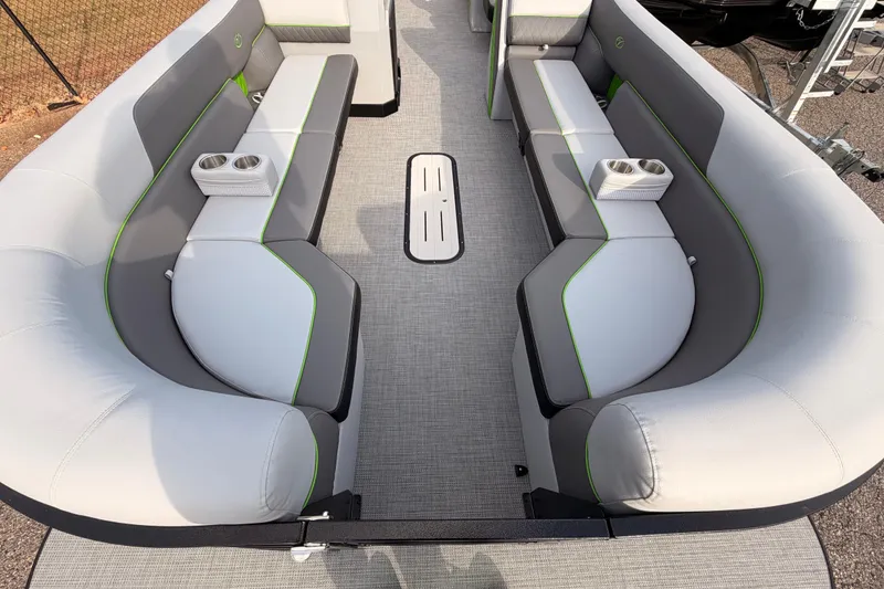 Slide: The Image of 2026 Veranda Vista Sport VS25RC boat interior with gray seating and cup holders. - 18