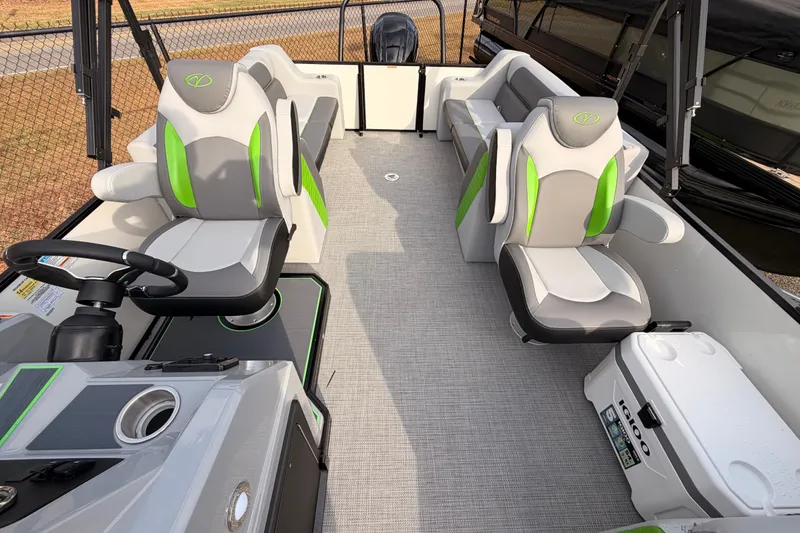 Slide: The Image of 2026 Veranda Vista Sport VS25RC pontoon boat interior with modern seating and steering console. - 19
