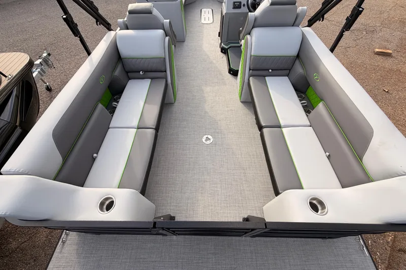 Slide: The Image of 2026 Veranda Vista Sport VS25RC boat interior with gray and green seating. - 22