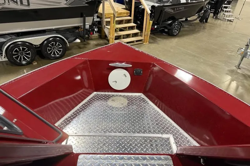 Slide: The Image of 2026 Hewescraft 200 ProV ET Hardtop boat interior with diamond plate flooring. - 10