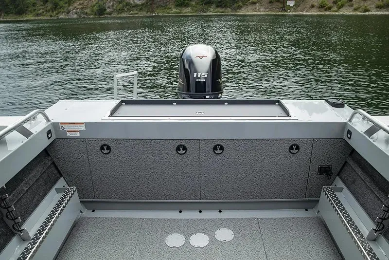 Slide: The Image of 2026 Hewescraft 200 ProV ET HT boat with Yamaha 115 engine on a serene lake. - 14