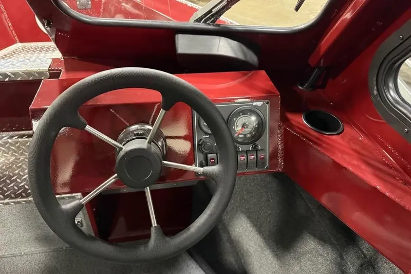 Slide: The Image of Steering wheel and dashboard of 2026 Hewescraft 200 ProV ET Hardtop boat. - 9