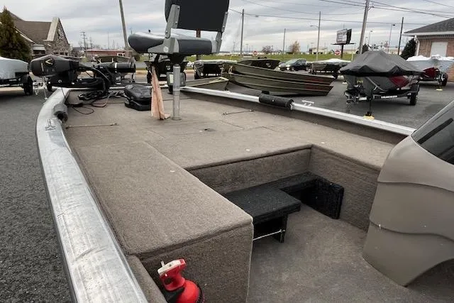 Slide: The Image of 2003 Tracker Pro Team 185 fishing boat interior with seating and equipment. - 9