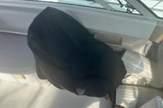 Slide: The Image of 2005 Carver 36 Mariner interior with covered seating area. - 10