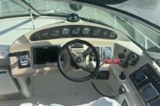 Slide: The Image of 2005 Carver 36 Mariner helm with steering wheel and instrument panel. - 4