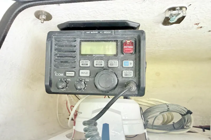 Slide: The Image of JL M6 8.8 Marine speakers installed on a 2003 Custom 23 Center Console boat. - 8