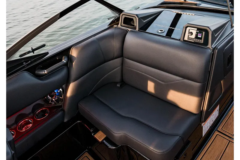 Slide: The Image of Manufacturer Provided Image: 2026 Moomba Mojo boat interior with sleek black seating and modern dashboard design. - 5