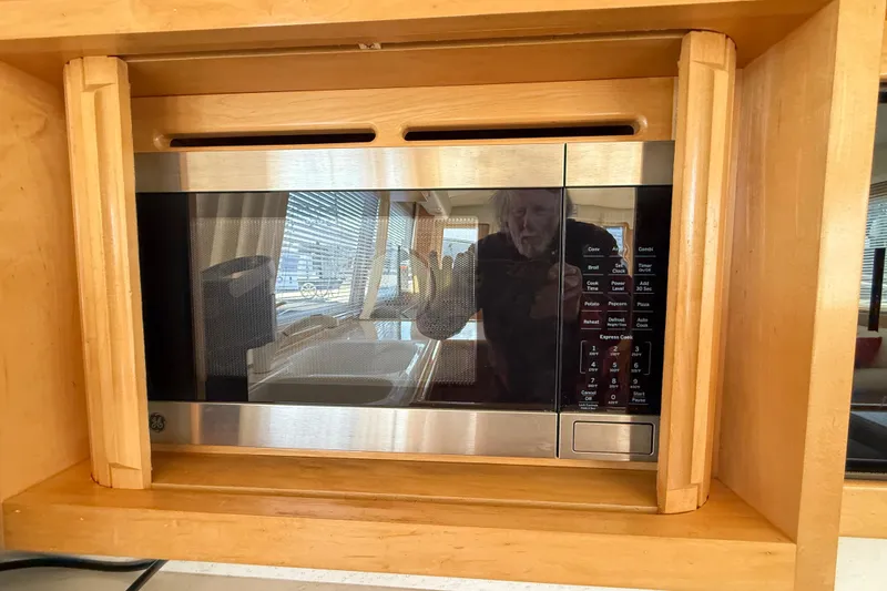 Slide: The Image of Built-in microwave in 1999 Navigator 5300 yacht kitchen. - 23
