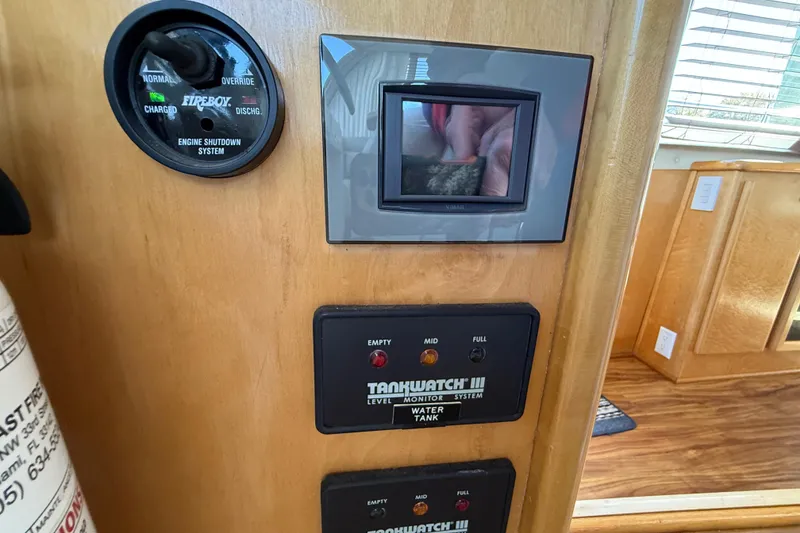 Slide: The Image of Control panel of a 1999 Navigator 5300 yacht with monitoring systems. - 32