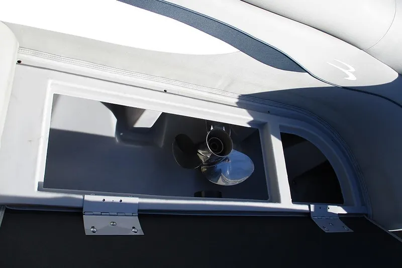 Slide: The Image of Storage compartment in a 2022 Bennington 20 SSR boat, featuring a propeller. - 15