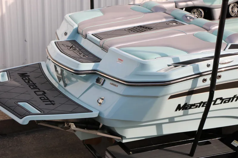 Slide: The Image of 2014 Master Craft X-Star boat, rear view with swim platform and seating. - 10