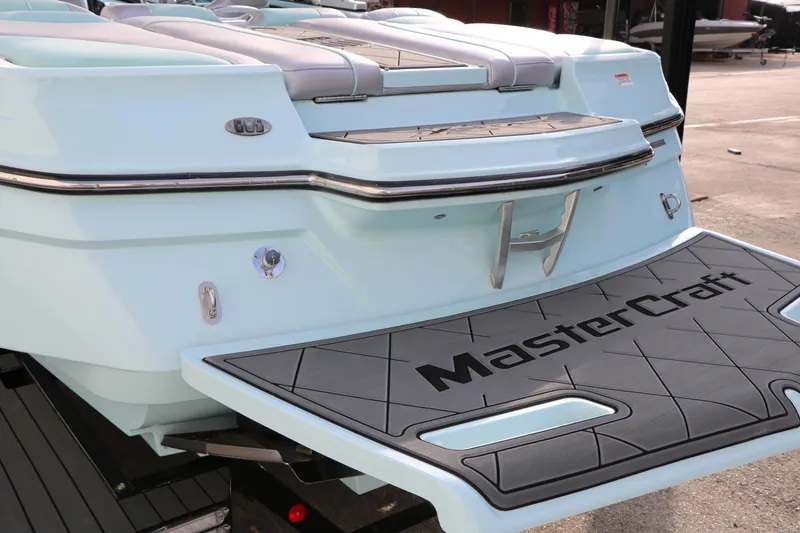 Slide: The Image of 2014 Master Craft X-Star boat rear view with swim platform. - 11