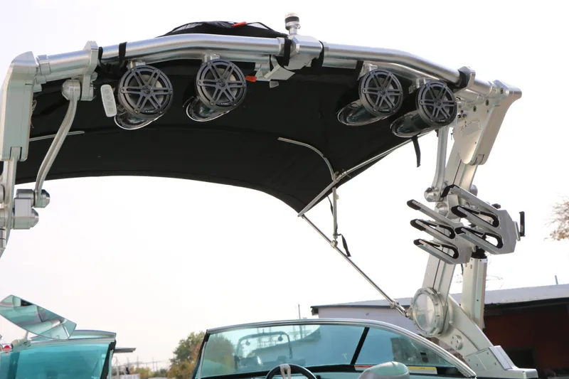 Slide: The Image of 2014 Master Craft X-Star boat with speakers and wakeboard racks on tower. - 14