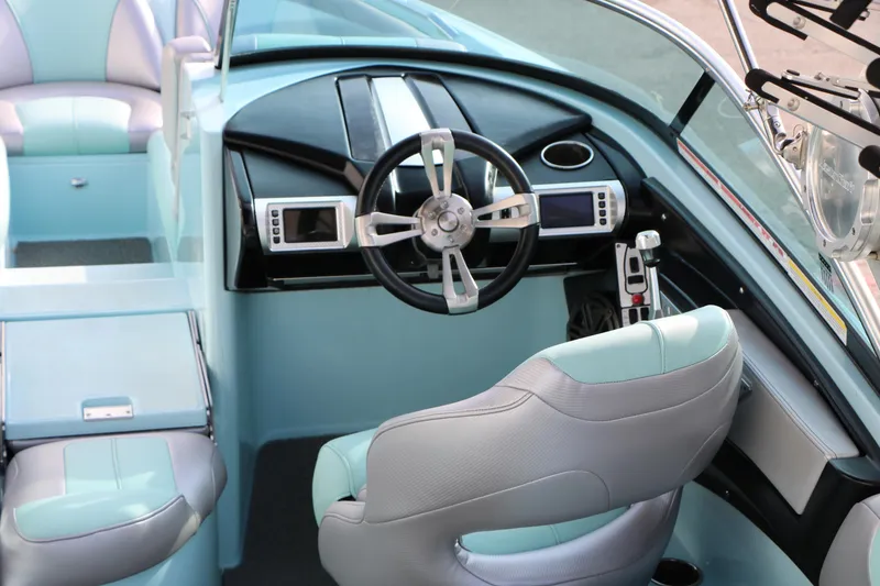 Slide: The Image of 2014 Master Craft X-Star boat interior with modern steering and dashboard design. - 22