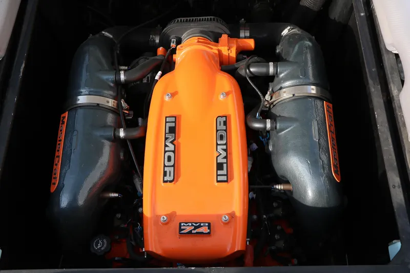Slide: The Image of 2014 Master Craft X-Star Ilmor MV8 7.4 engine, vibrant orange cover, detailed view. - 30