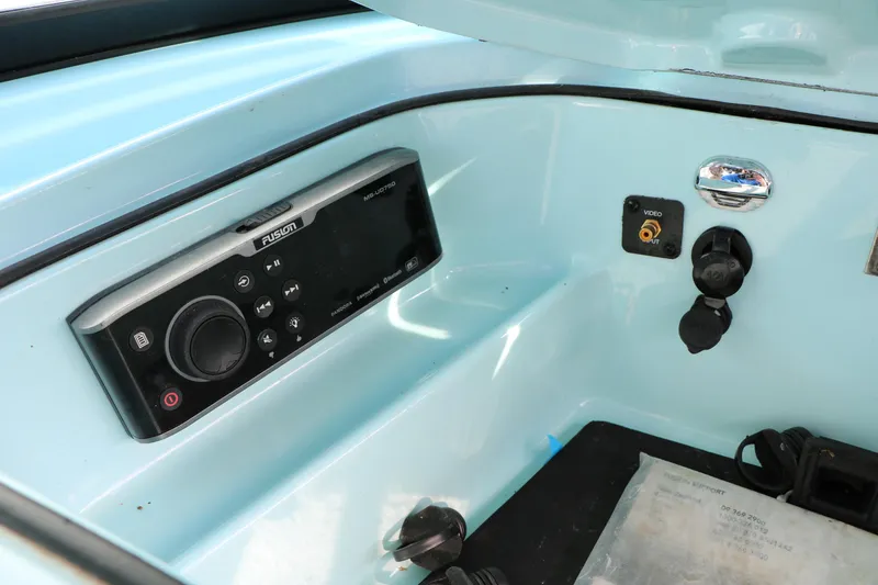 Slide: The Image of 2014 Master Craft X-Star boat dashboard with Fusion audio system and video output. - 34