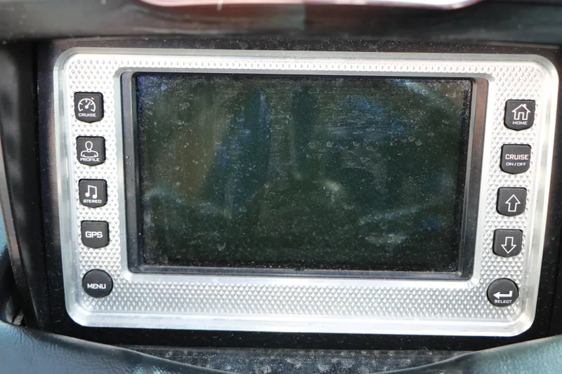 Slide: The Image of 2014 Master Craft X-Star dashboard display with control buttons for cruise, stereo, and GPS. - 40