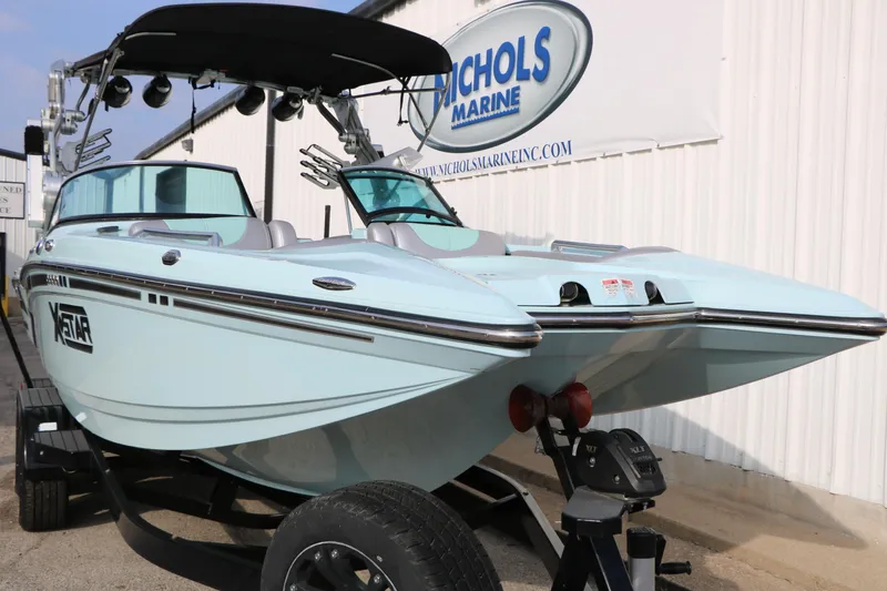 Slide: The Image of 2014 Master Craft X-Star boat on trailer at Nichols Marine dealership. - 6