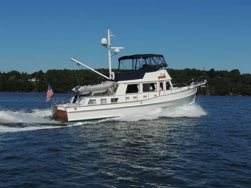 Slide: The Image of Grand Banks 42 Classic yacht cruising on a sunny day, 2002 model. - 3