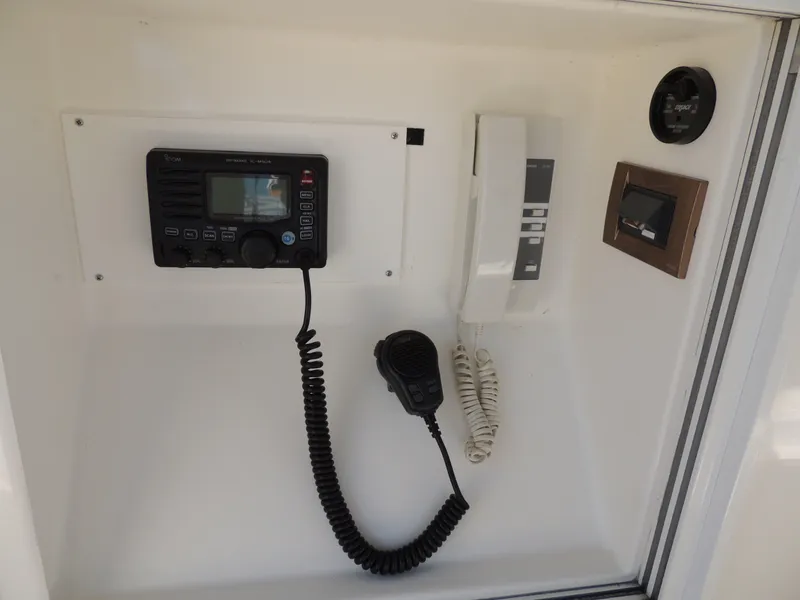 Slide: The Image of Communication equipment panel on a 2002 Grand Banks 42 Classic yacht. - 34