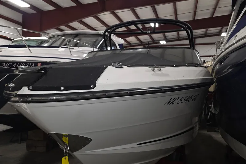 Slide: The Image of 2017 Sea Ray SLX 280 boat in indoor storage facility. - 0